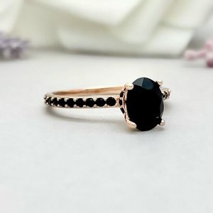 NIB, rose gold and black onyx cocktail ring.